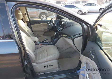 2015 Ford Escape Titanium z USA, uszkodzony, nr VIN 1FMCU0J93FUB92994